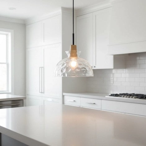 A close-up of a high-quality hammered glass dome pendant light showing its thick, durable construction and beautiful texture.