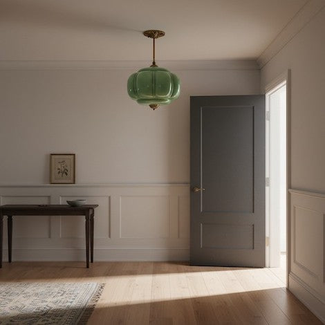 Lumi Eloise green glass pumpkin semi-flush mount installed in a modern entryway.