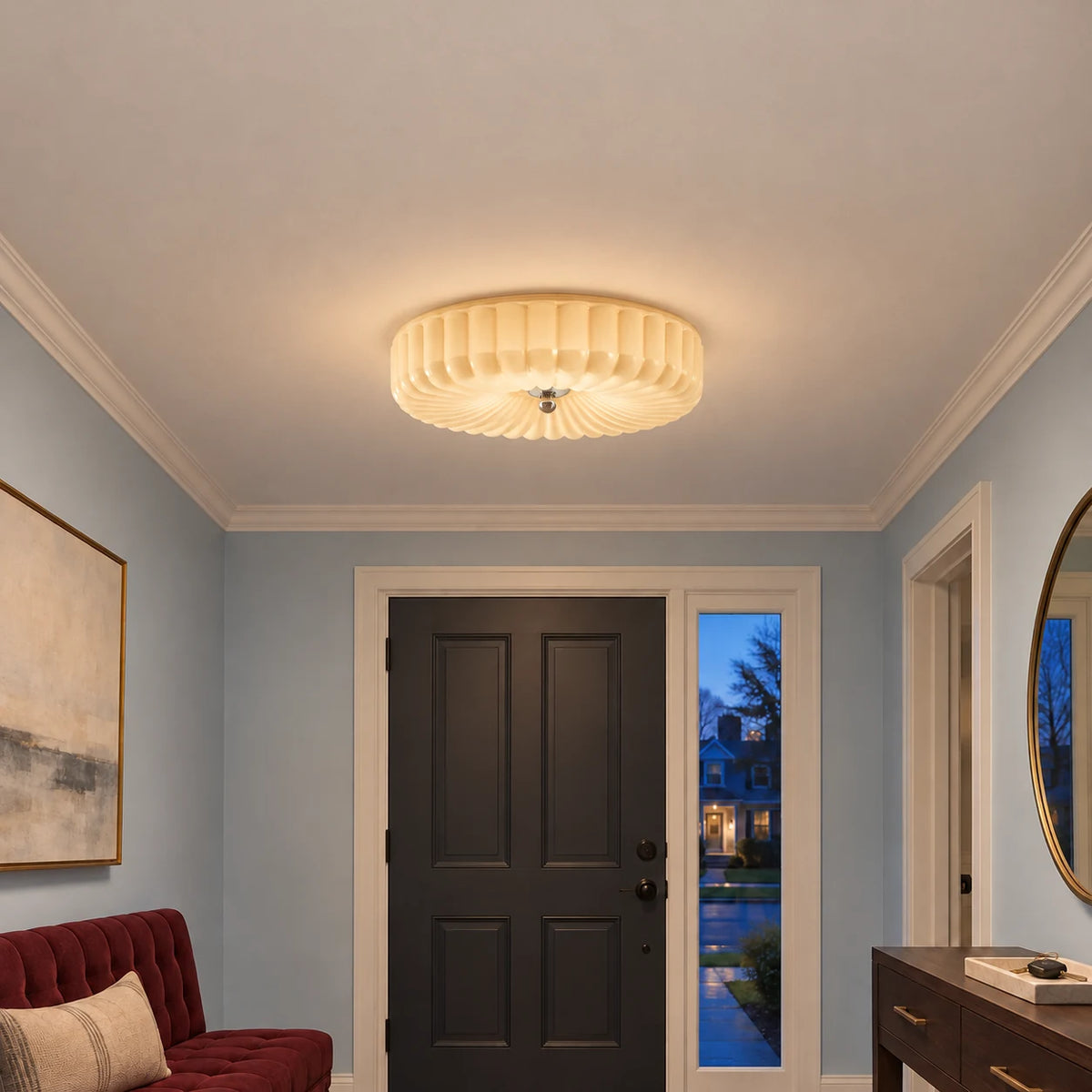 Maelis large beige glass flush mount in an evening entry lounge