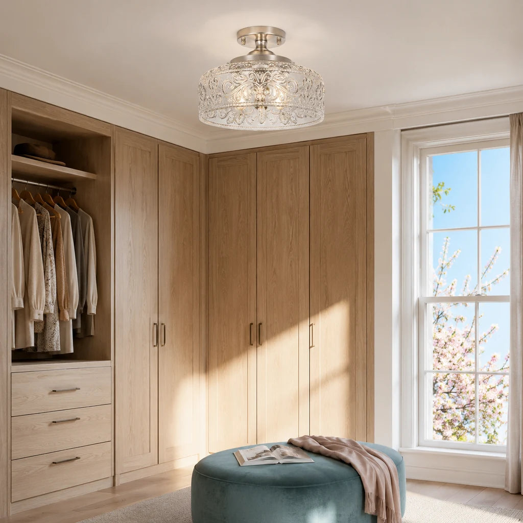 Brushed nickel etched clear glass ceiling light in a sunlit dressing room