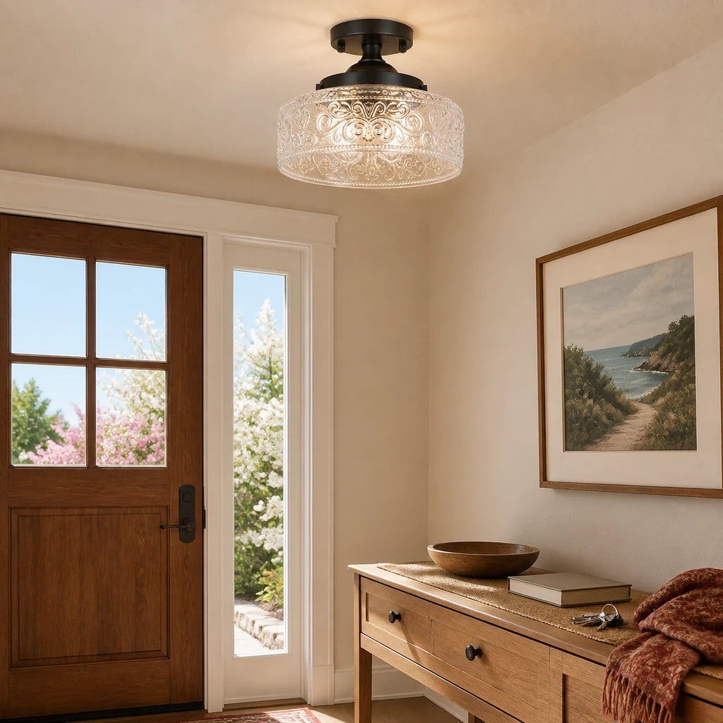 Rosalie matte black etched clear glass ceiling light in a sunny entry vestibule