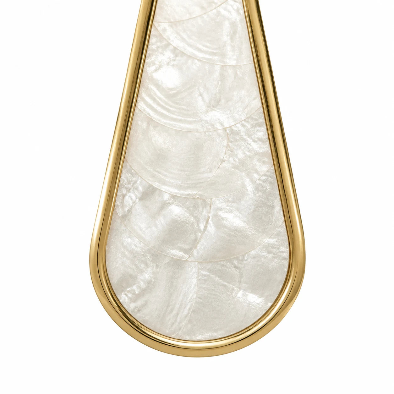 Close view of pearly Capiz shell panels framed in warm gold metal