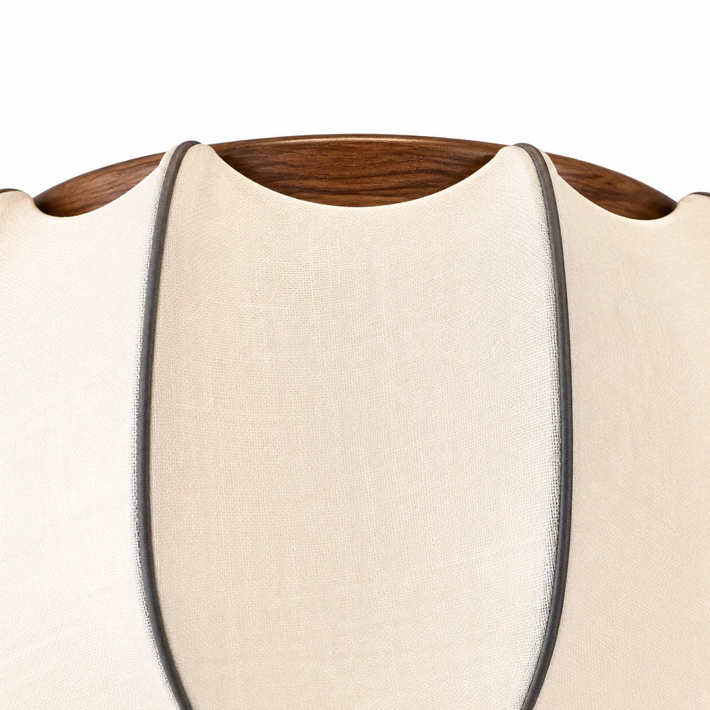 Close view of Alina walnut scallop accents and silk petal edge