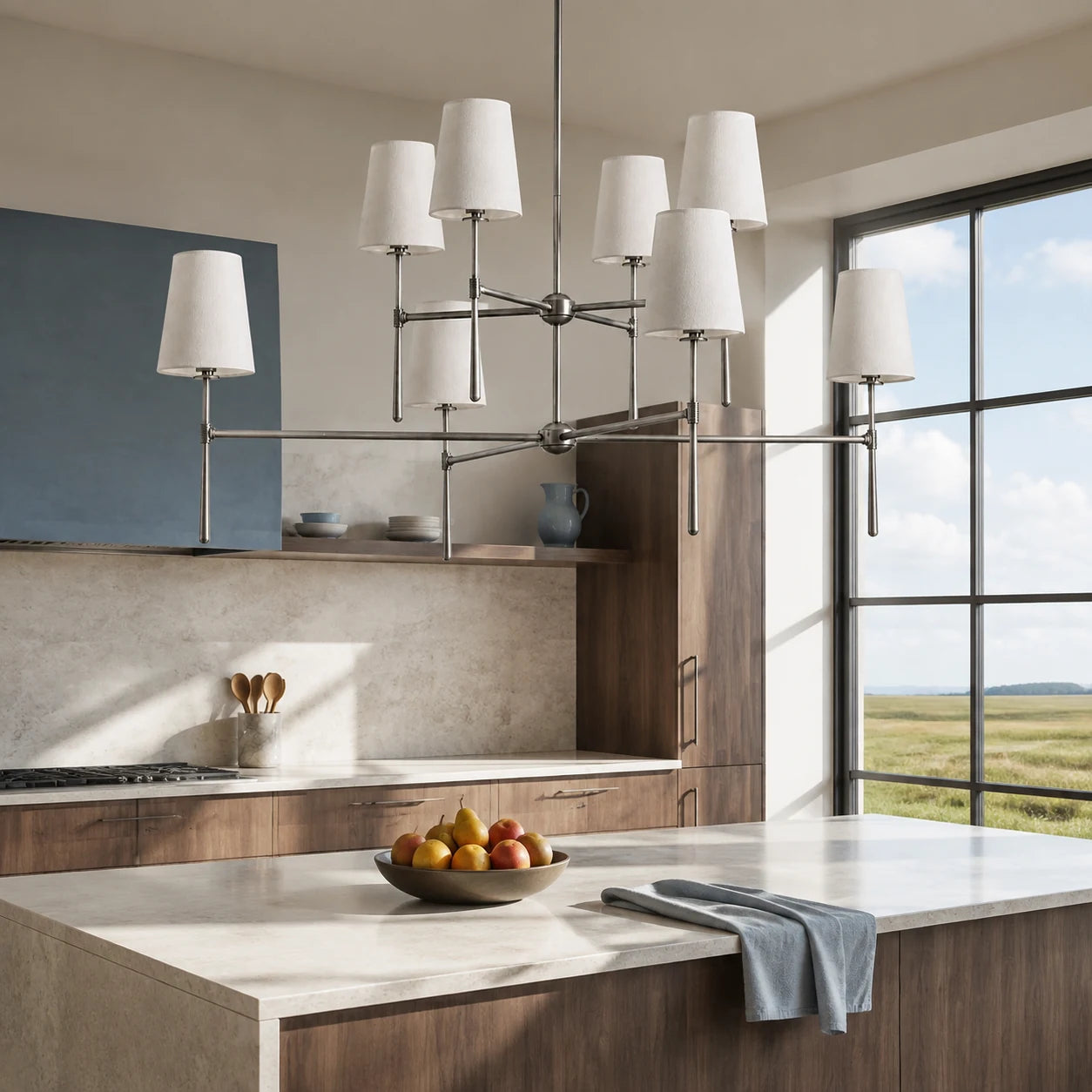 Nickel eight-light two-tier chandelier above a large stone kitchen island