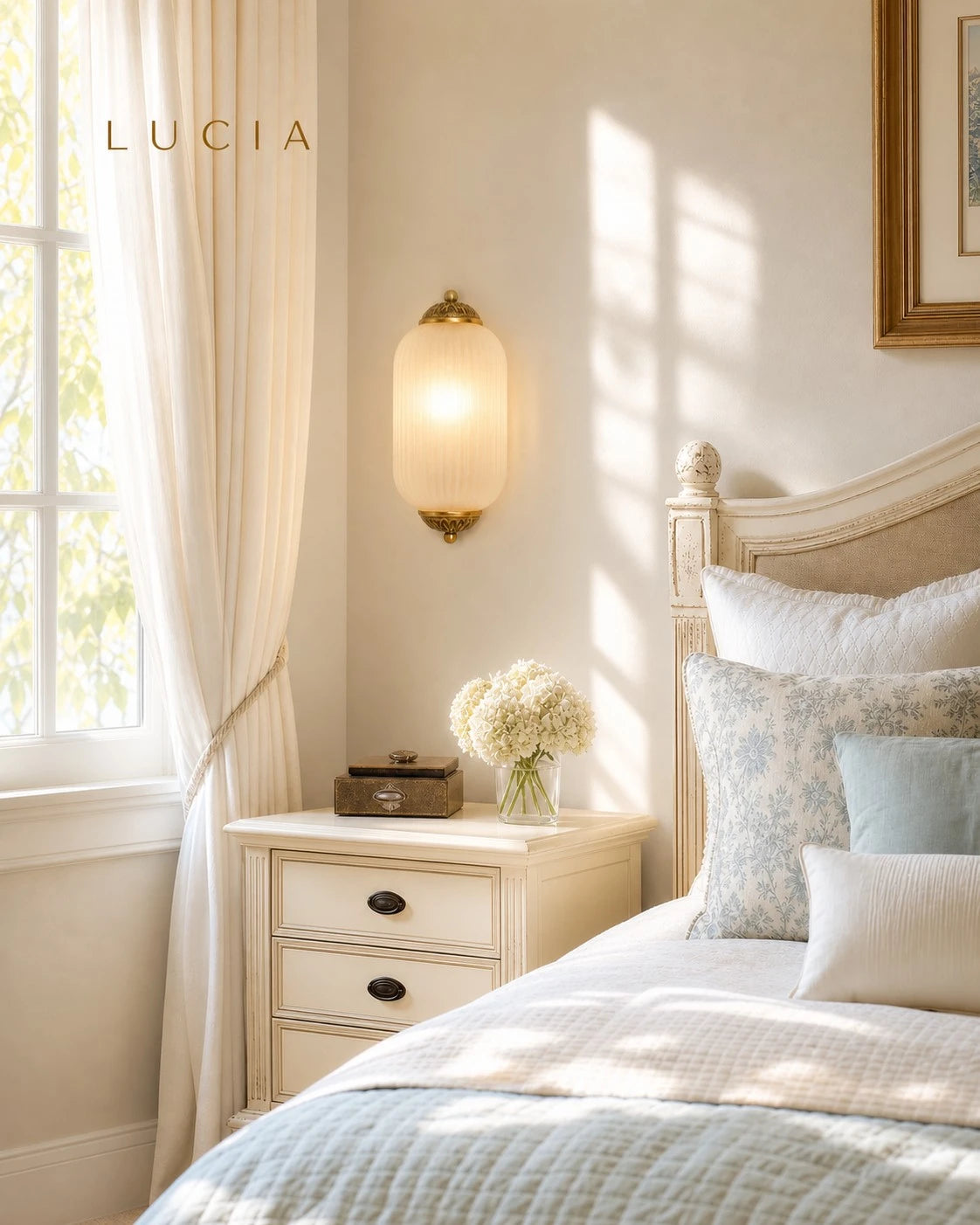 Lumi Eloise milk glass sconce installed beside a bright bedroom