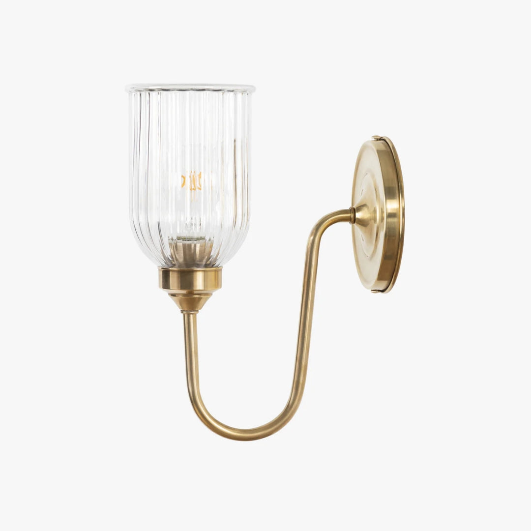 Menae wall sconce in Burnished Brass on a white background