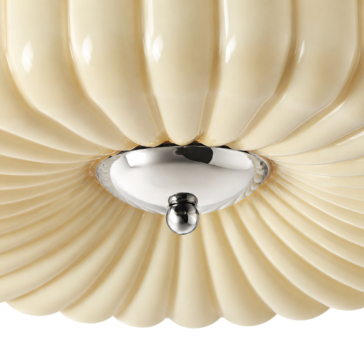 Extreme close view of the Maelis polished chrome center finial on a pure white background