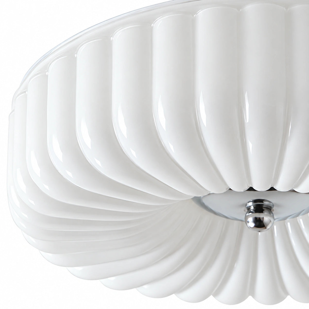 Close view of Maelis white scalloped glass edge on a pure white background