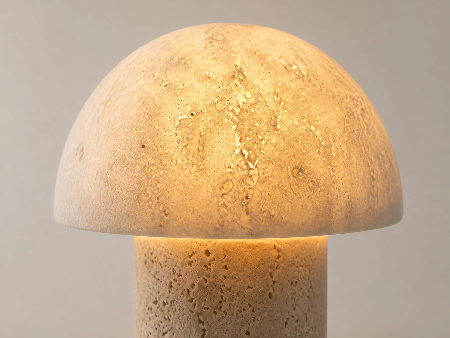 Warm light glowing through travertine